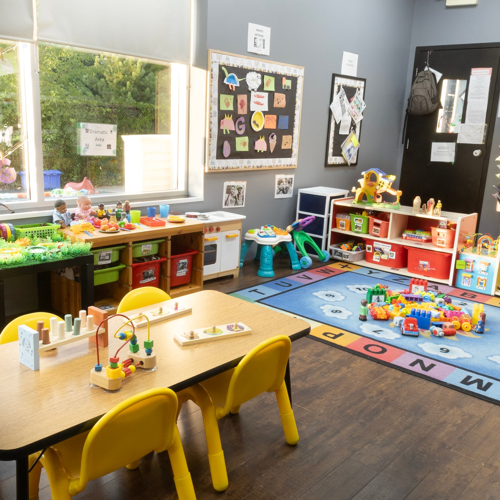 A classroom arranged for a day of play and learning at Tender Years